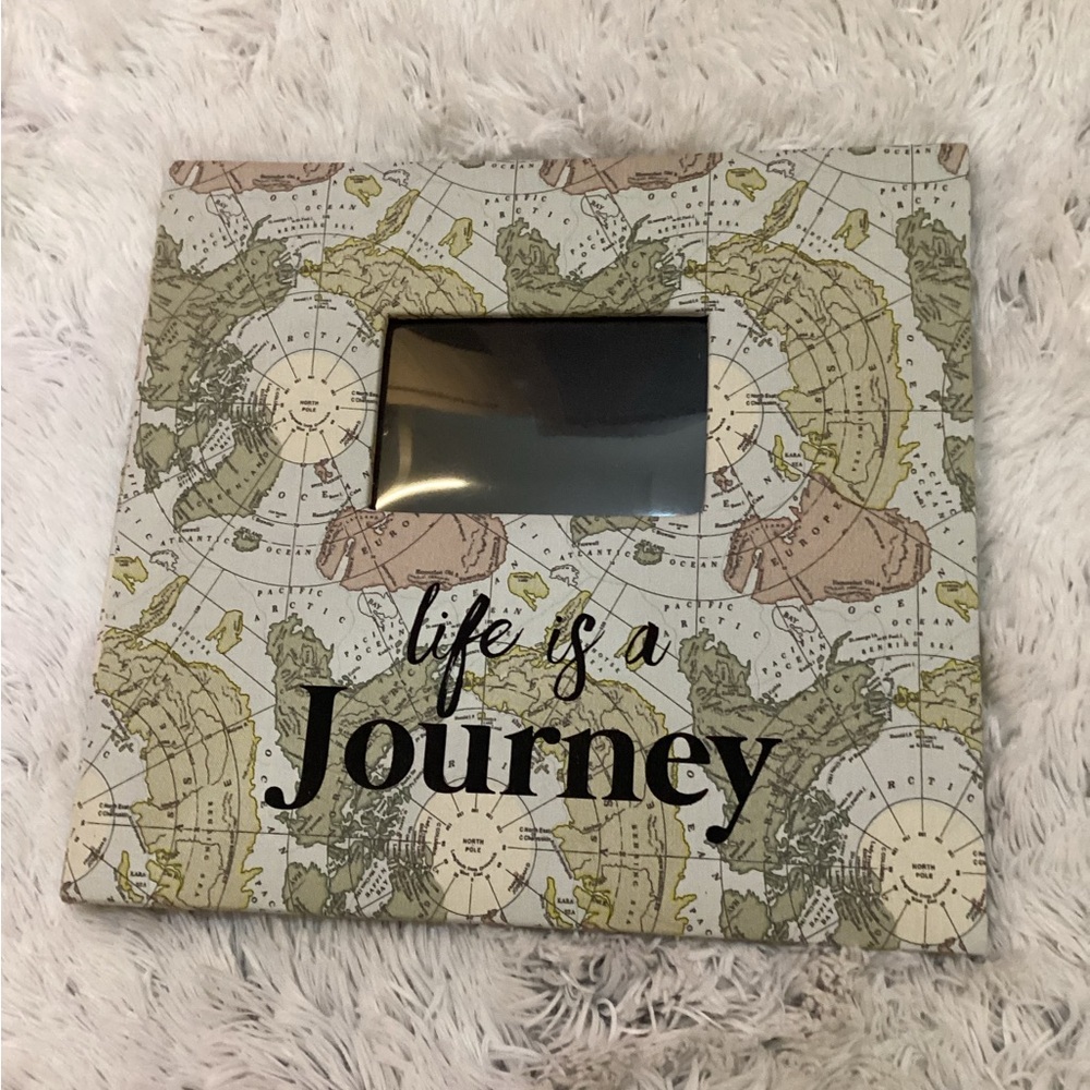 Unbranded scrapbook gently used map theme with a spot for photo on cover